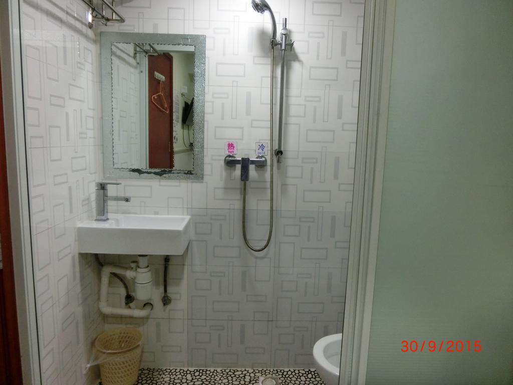 Li Cheng Guesthouse Hongkong Rum bild