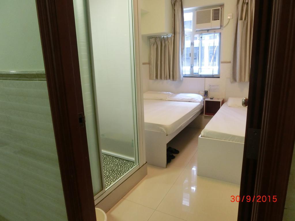 Li Cheng Guesthouse Hongkong Rum bild