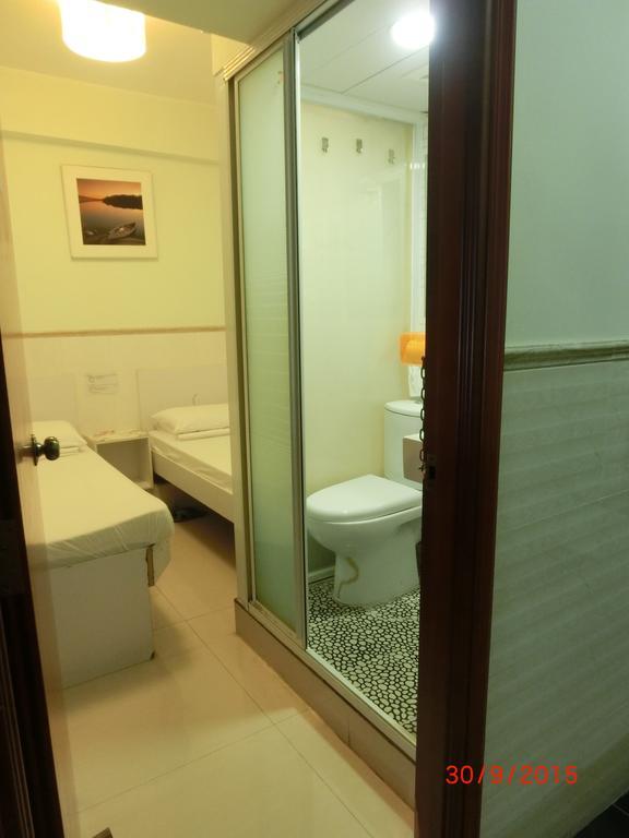 Li Cheng Guesthouse Hongkong Rum bild